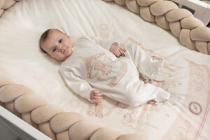 Beige Carousel Babygrow Image boy